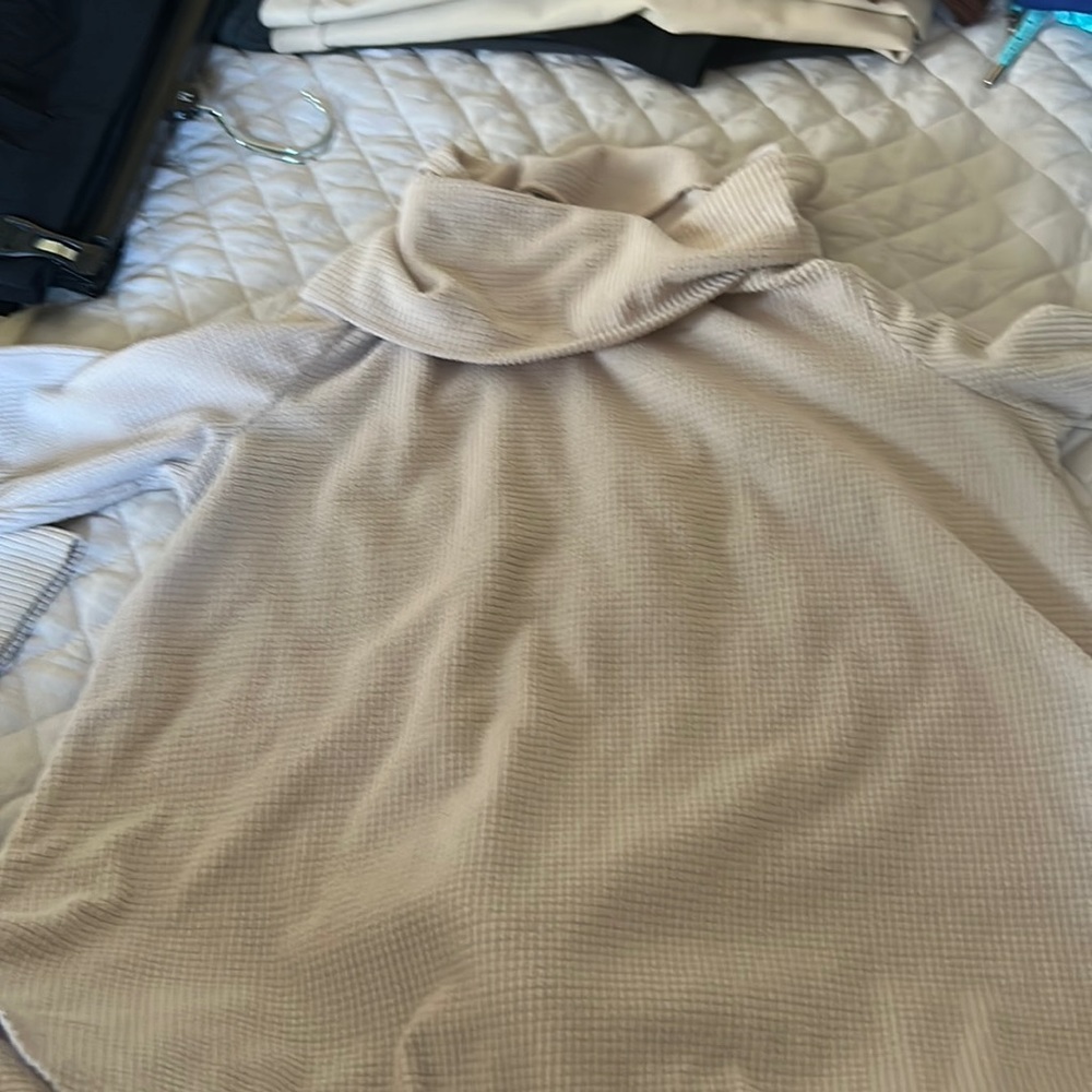 White turtleneck sweater